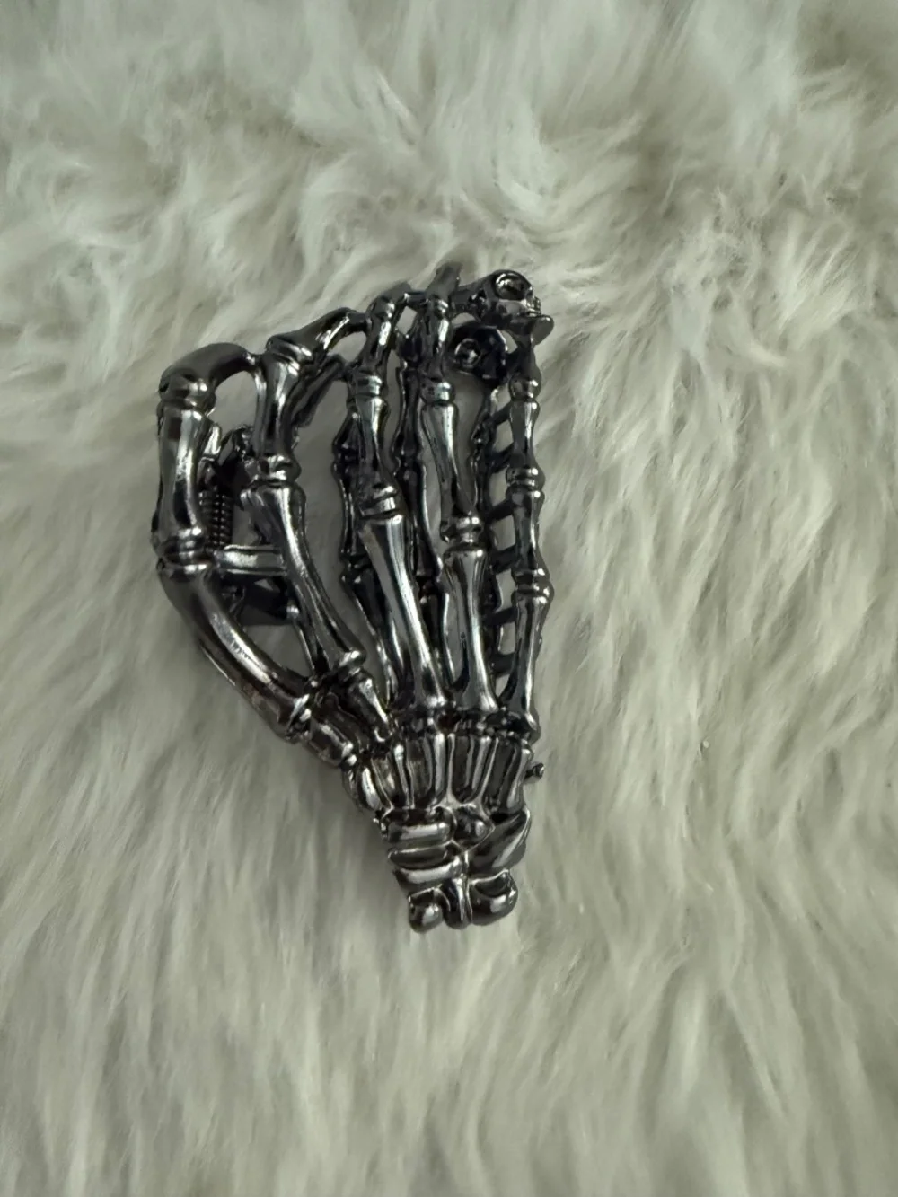 Nicole Miller NY Titanium Black Skelton Hand Hair Clip